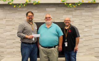 Sew Hop’d Makes Donation to Huntley Area Public Library