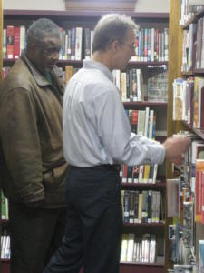 Librarian helping patron